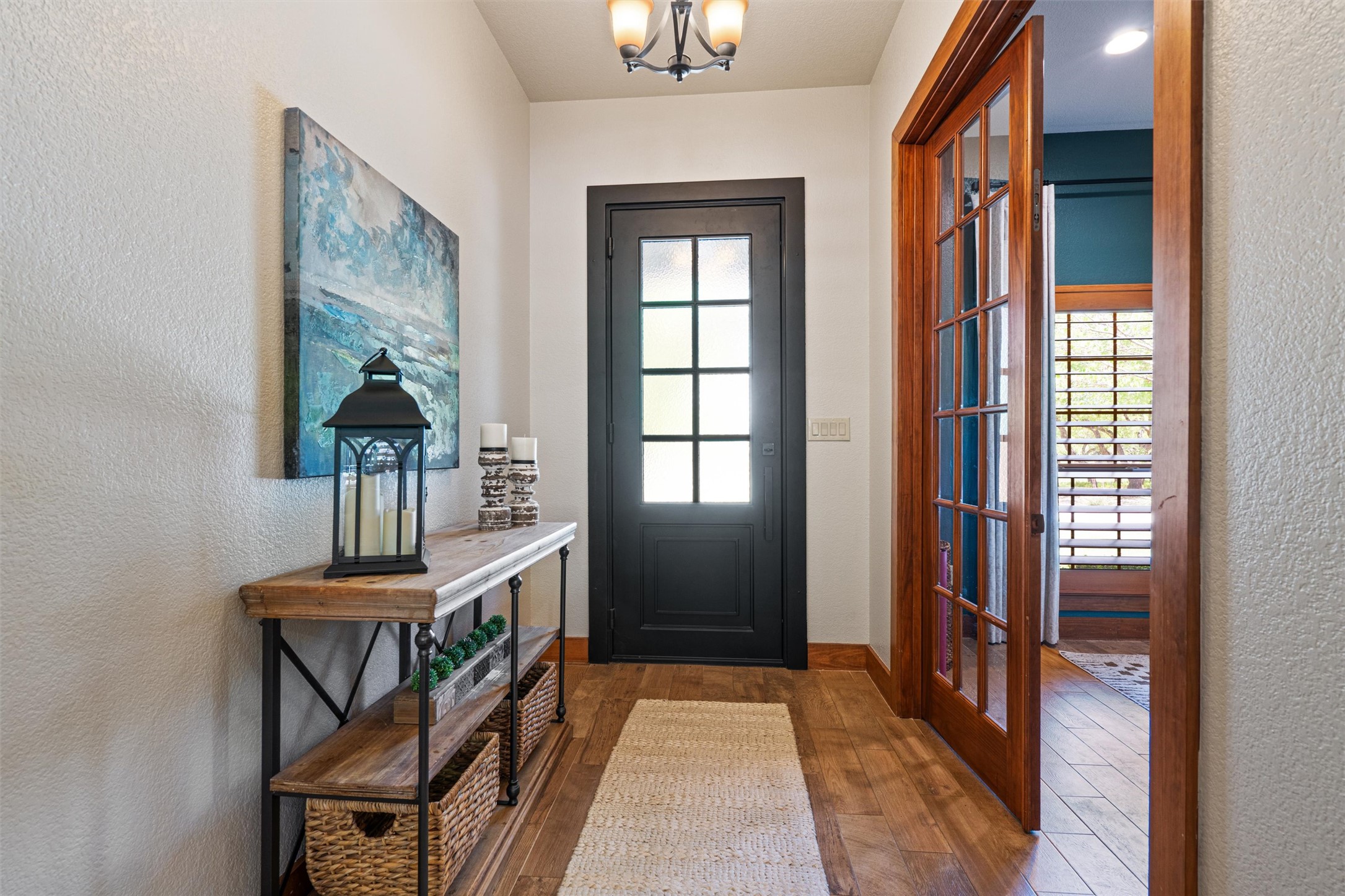 200 Little River Road Liberty Hill, TX 78642 - Photo 3 of 40 a hallway with a stove and a window