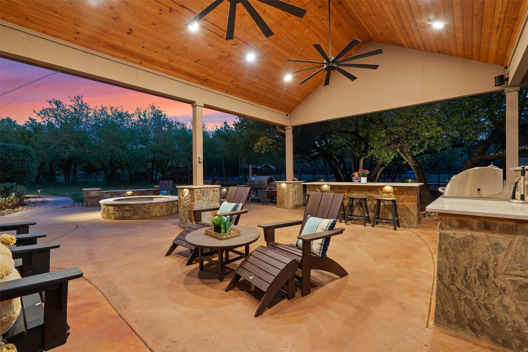 200 Little River Road Liberty Hill, TX 78642 - Photo 31 of 40 a view of a patio with a table and chairs