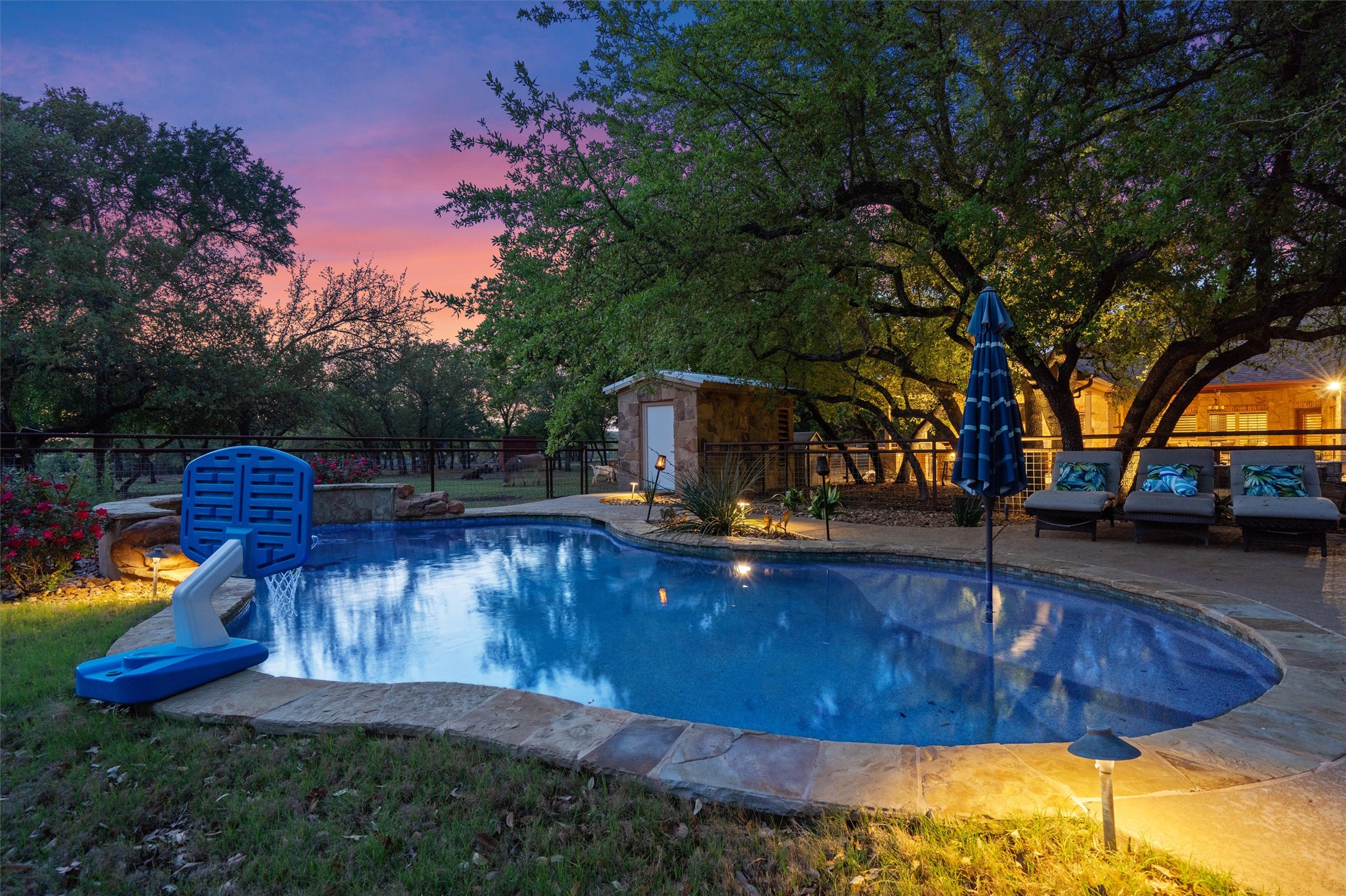 200 Little River Road Liberty Hill, TX 78642 - Photo 34 of 40 a view of a swimming pool with a patio
