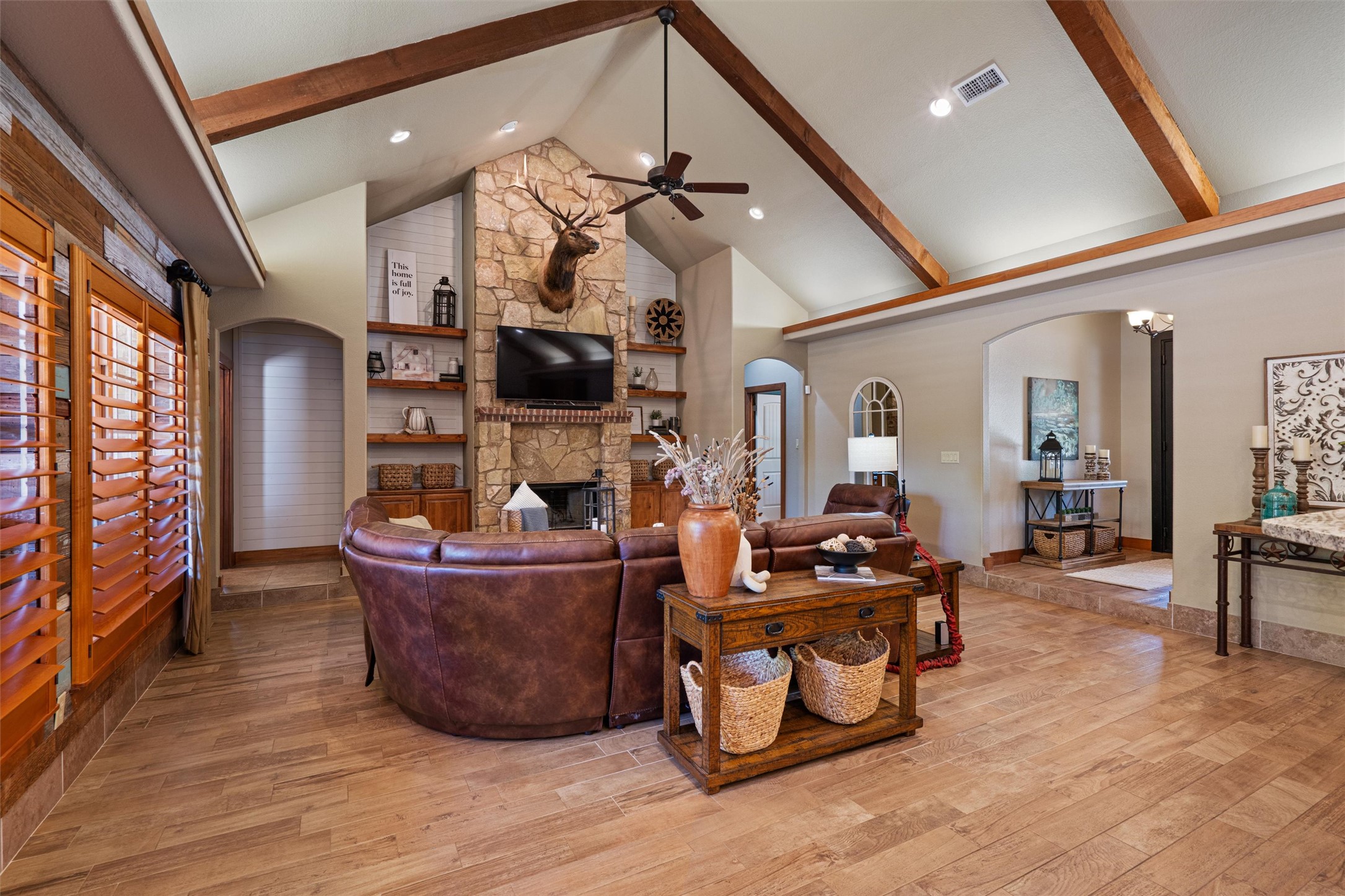 200 Little River Road Liberty Hill, TX 78642 - Photo 7 of 40 a living room with furniture and a fireplace