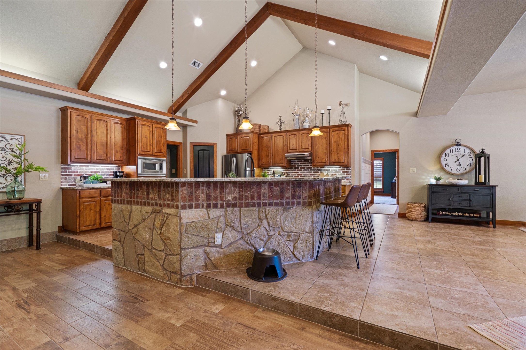 200 Little River Road Liberty Hill, TX 78642 - Photo 8 of 40 a living room with lots of furniture and kitchen view