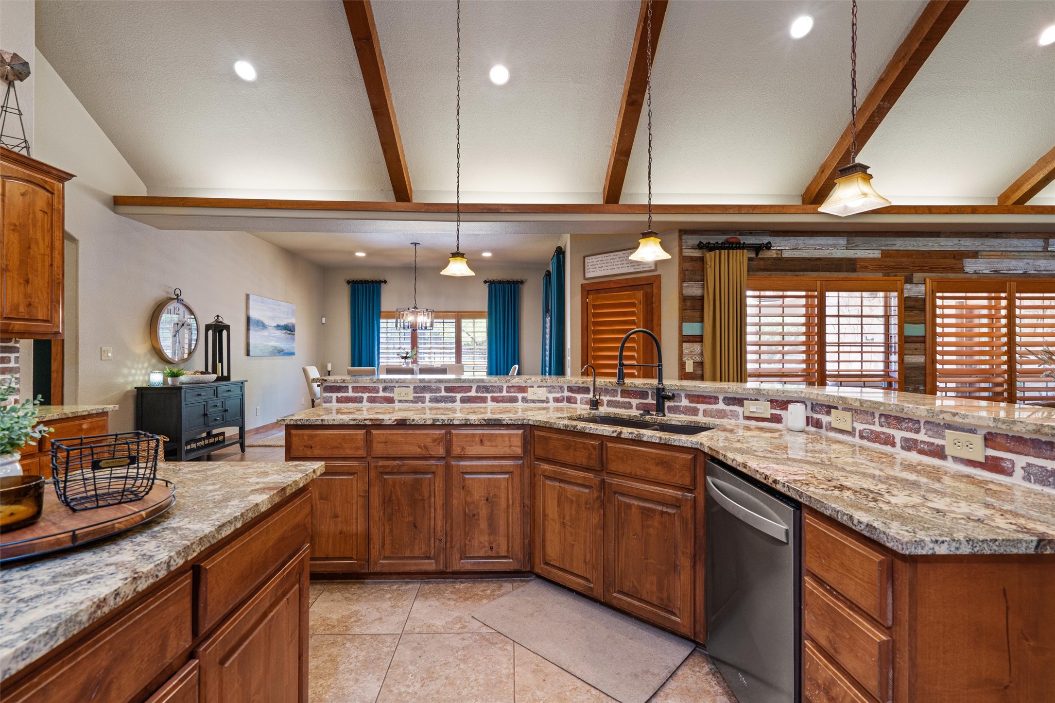 200 Little River Road Liberty Hill, TX 78642 - Photo 10 of 40 a kitchen with lots of counter space and windows