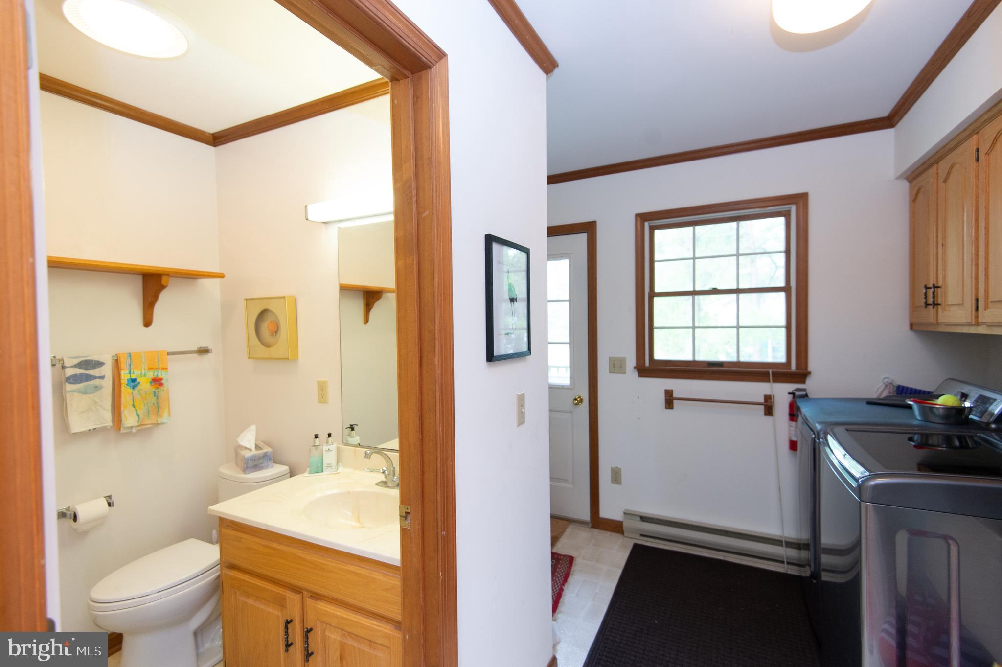 5343 Cassons Neck Road Cambridge, MD 21613 - Photo 15 of 50 first floor half bath/laundry room