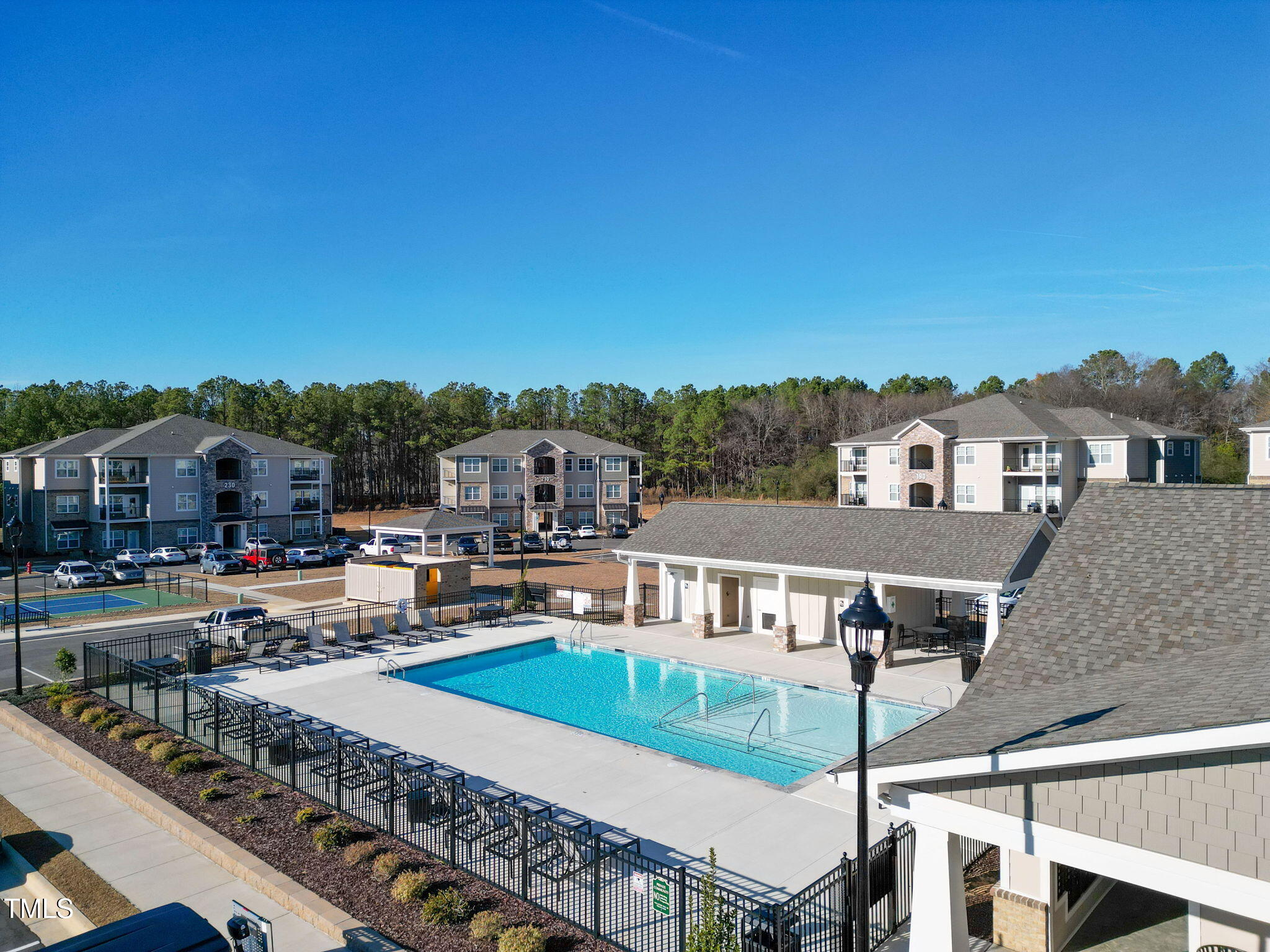 130 Grove Circle, Unit 204 Lillington, NC 27546 - Photo 19 of 28 a view of a house with roof deck
