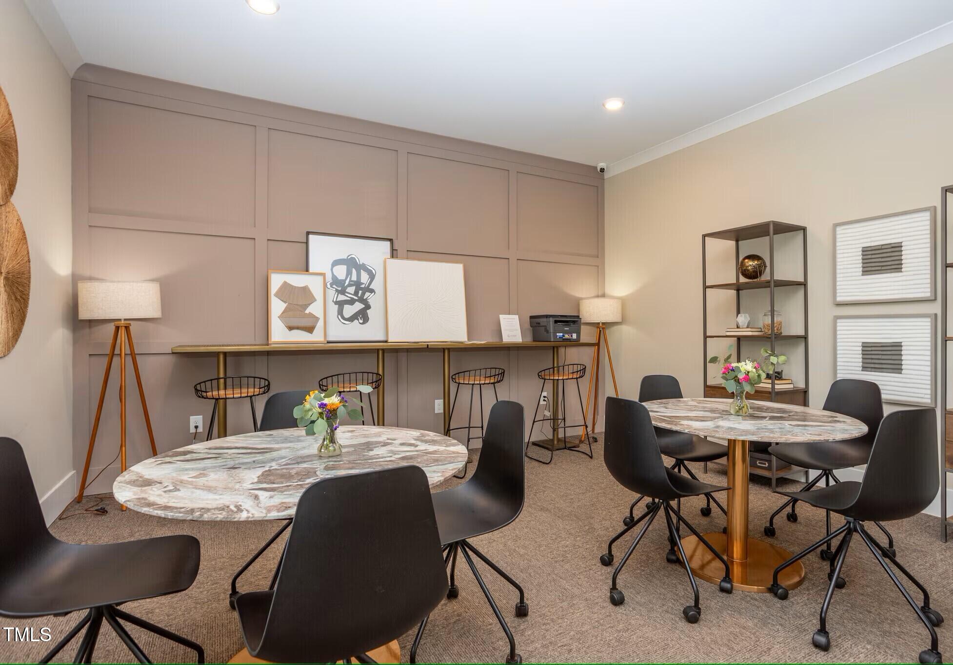 130 Grove Circle, Unit 204 Lillington, NC 27546 - Photo 22 of 28 a view of a dining room with furniture