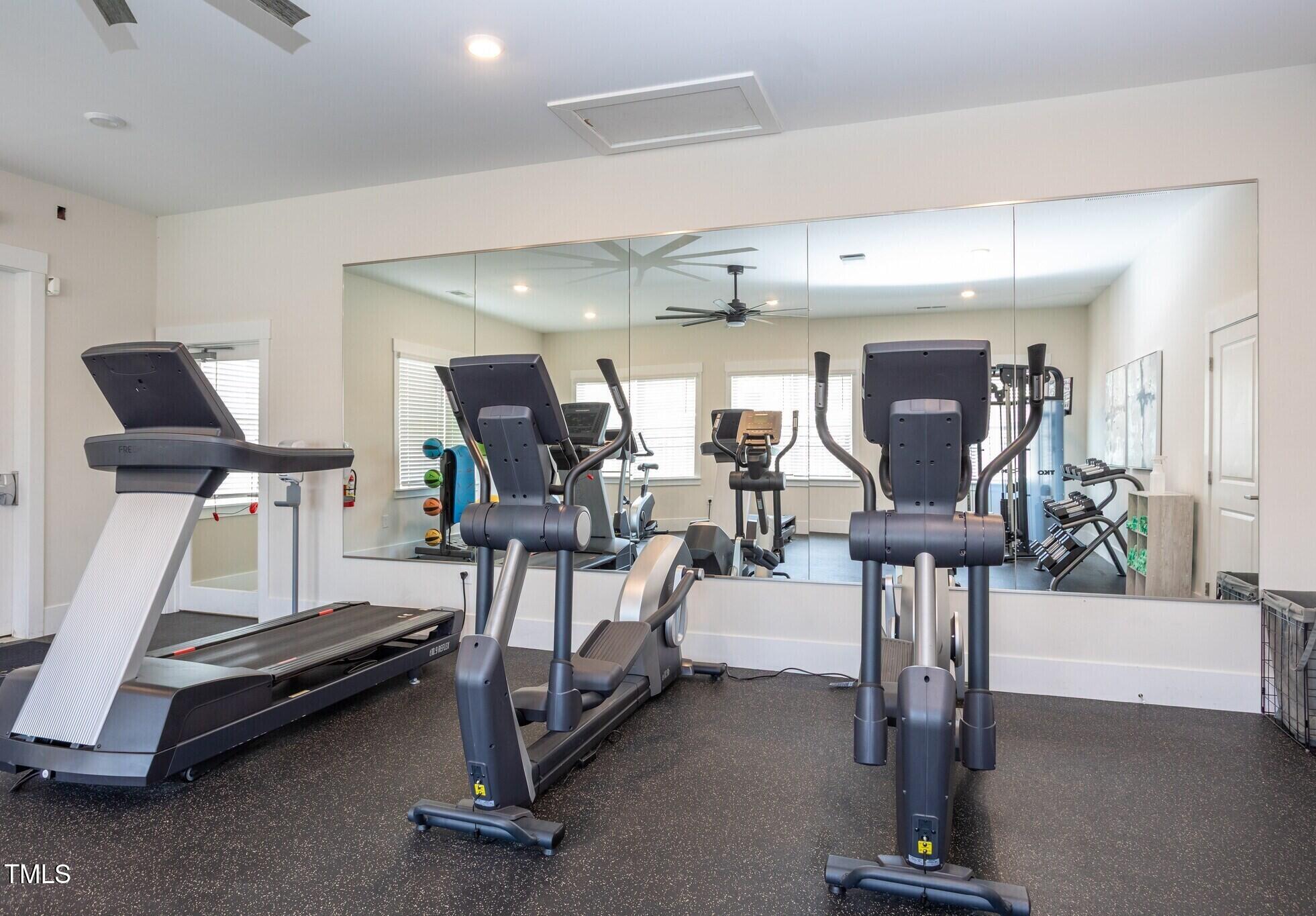 130 Grove Circle, Unit 204 Lillington, NC 27546 - Photo 24 of 28 a view of a room with gym equipment