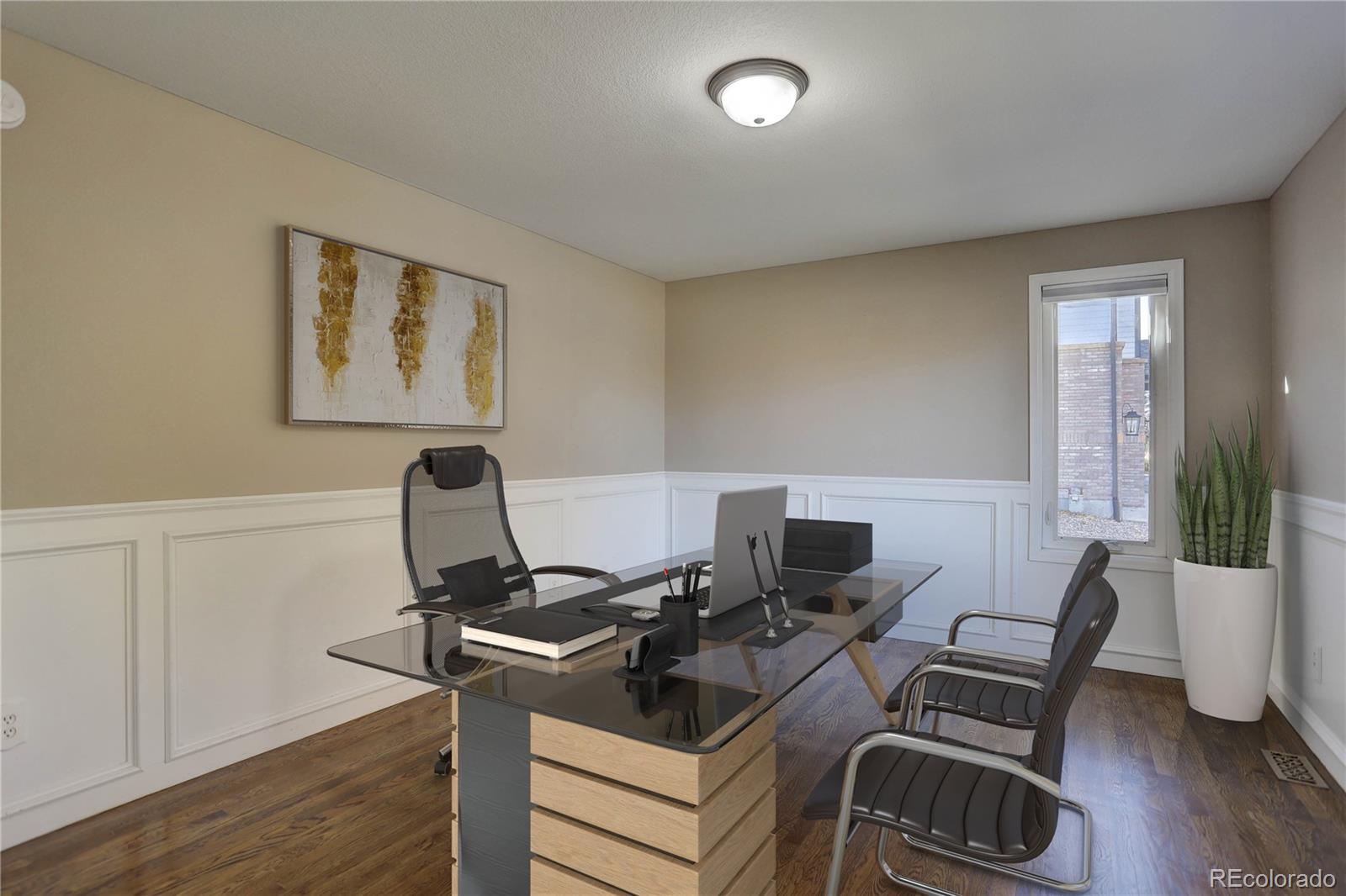 3804 Simms Street Wheat Ridge, CO 80033 - Photo 19 of 40 a work room with furniture and wooden floor