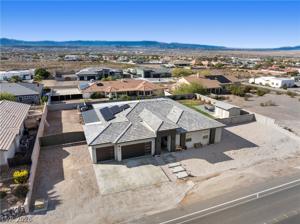 432 North Racetrack Road Henderson, NV 89015 - Photo 9 of 45 Aerial perspective of suburban area featuring a mountain backdrop