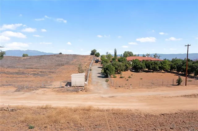 a view of a lake with a yard