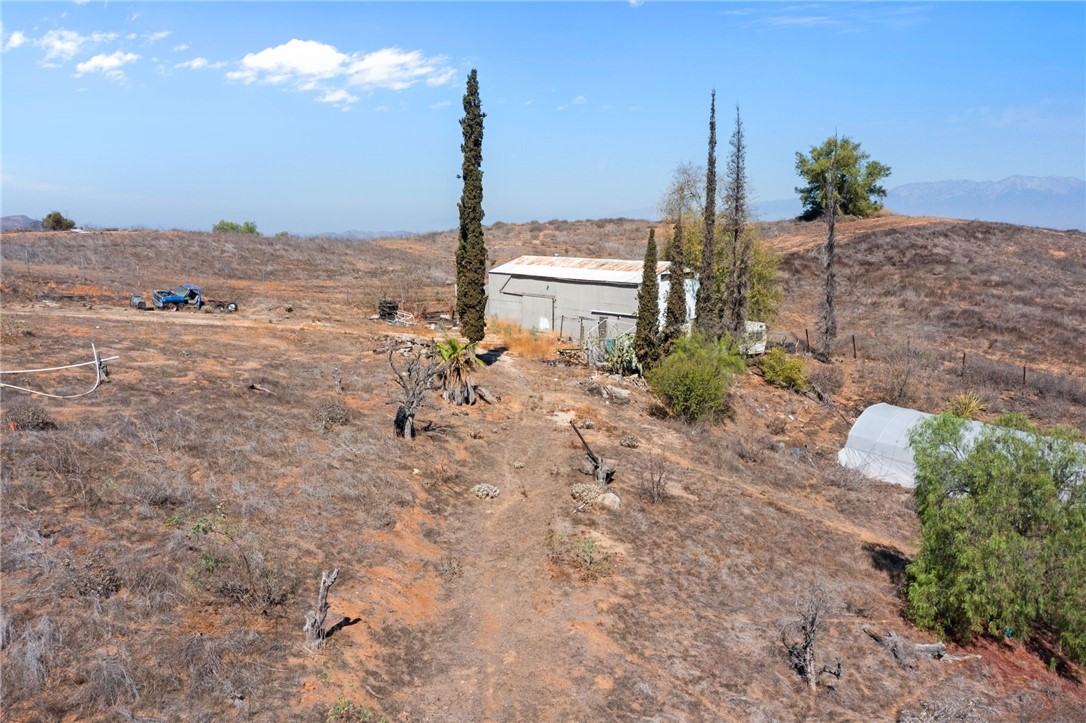 14350 Blackburn Road Riverside, CA 92503 - Photo 25 of 36 a view of a beach with a palm tree