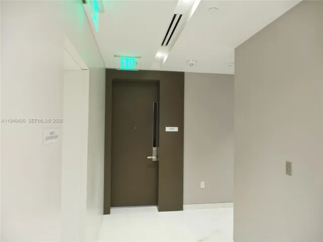 a view of staircase with large window