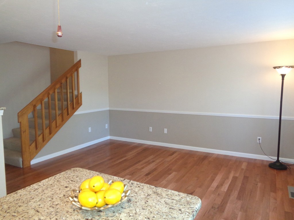 28 Southbridge Road, Unit 307 Charlton, MA 01507 - Photo 8 of 28 a view of an empty room with wooden floor