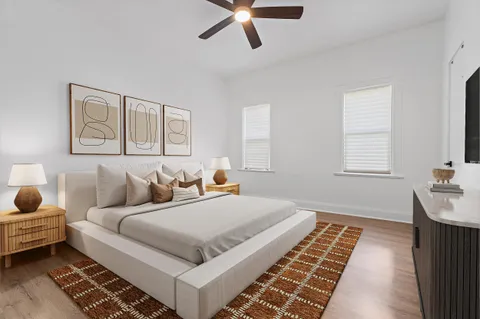 a bedroom with a bed and a couch