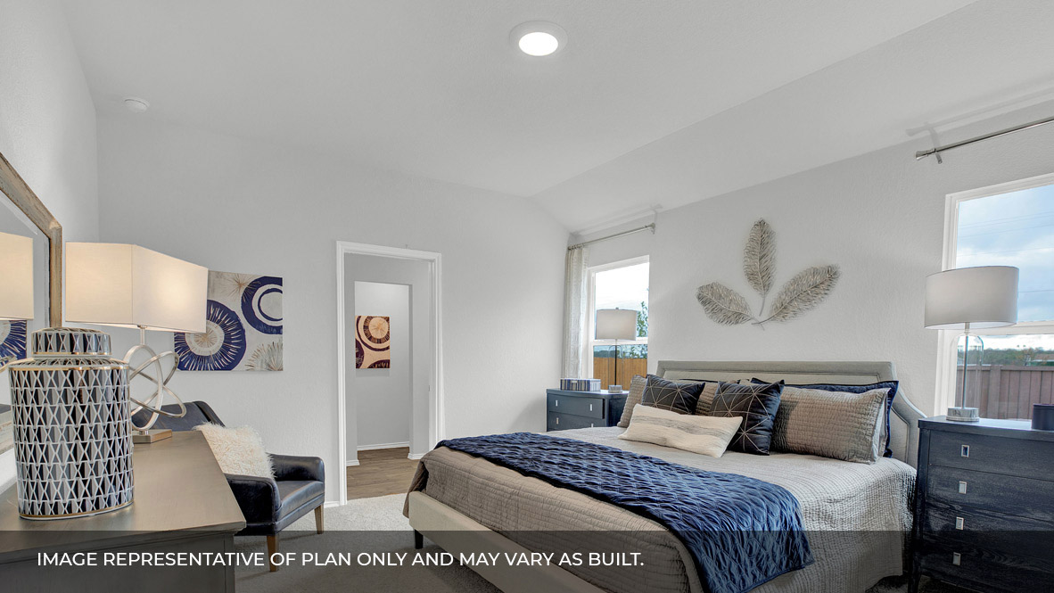 186 Morning Glory Loop Kyle, TX 78640 - Photo 14 of 21 a bedroom with a bed and a window