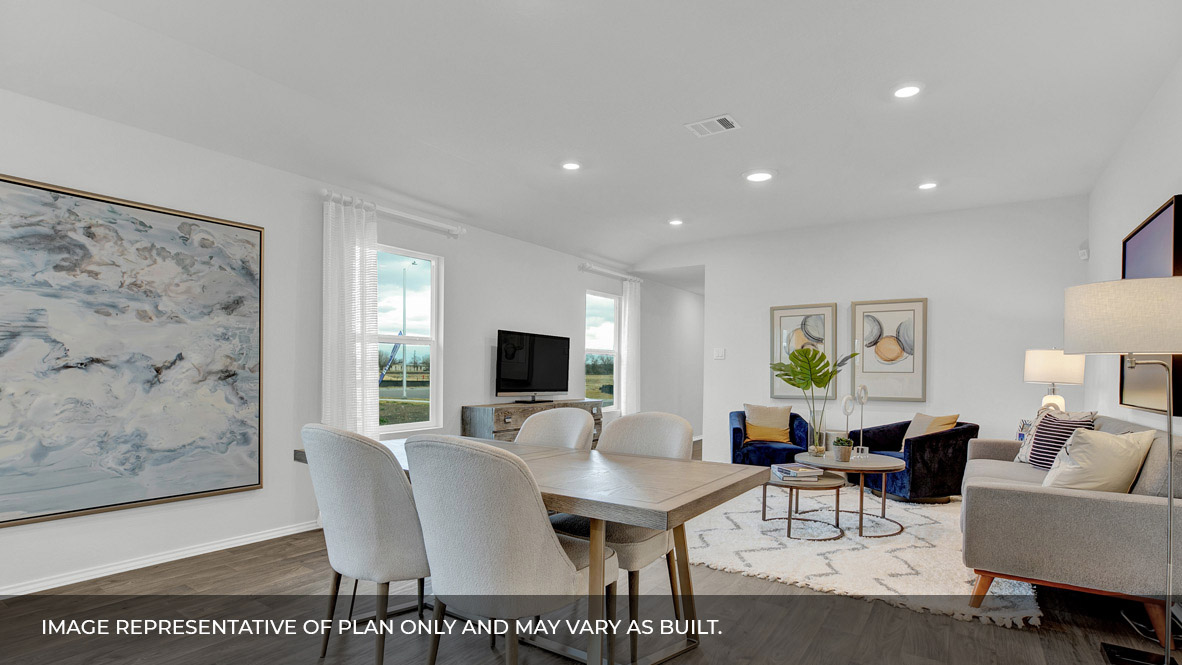 186 Morning Glory Loop Kyle, TX 78640 - Photo 8 of 21 a living room with furniture a rug and a flat screen tv