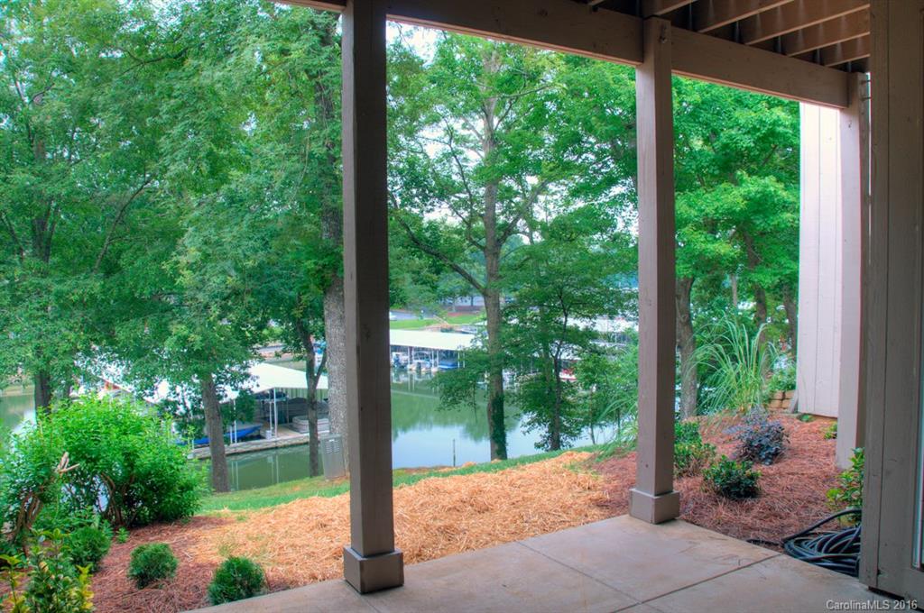 83 Ridgeport Road, Unit 83B Lake Wylie, SC 29710 - Photo 22 of 24 a view of a porch with a yard