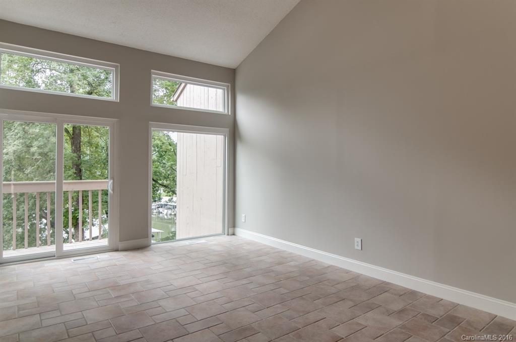 83 Ridgeport Road, Unit 83B Lake Wylie, SC 29710 - Photo 7 of 24 an empty room with windows