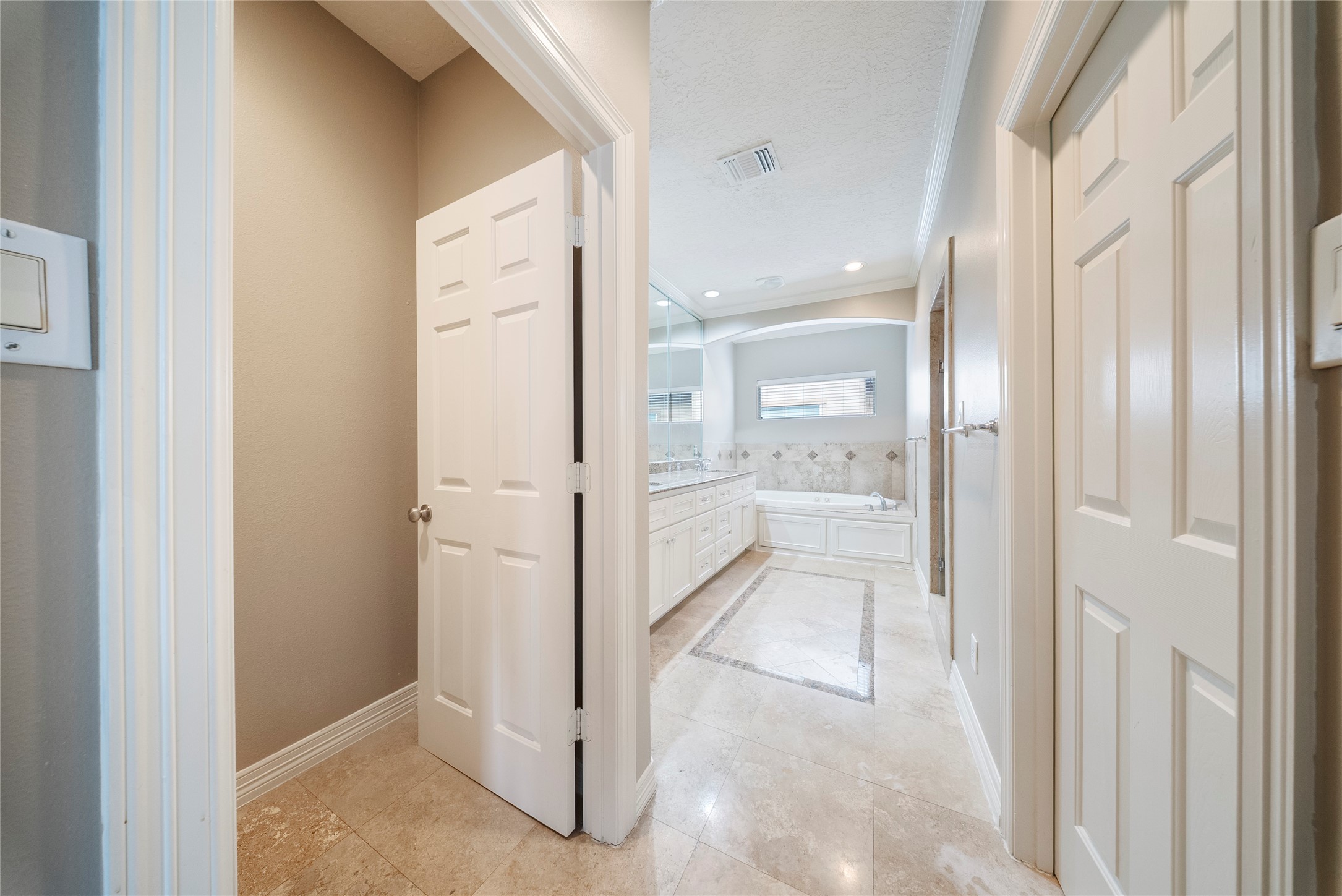 4216 Eli Street Houston, TX 77007 - Photo 13 of 25 a bathroom with a glass shower door and a mirror