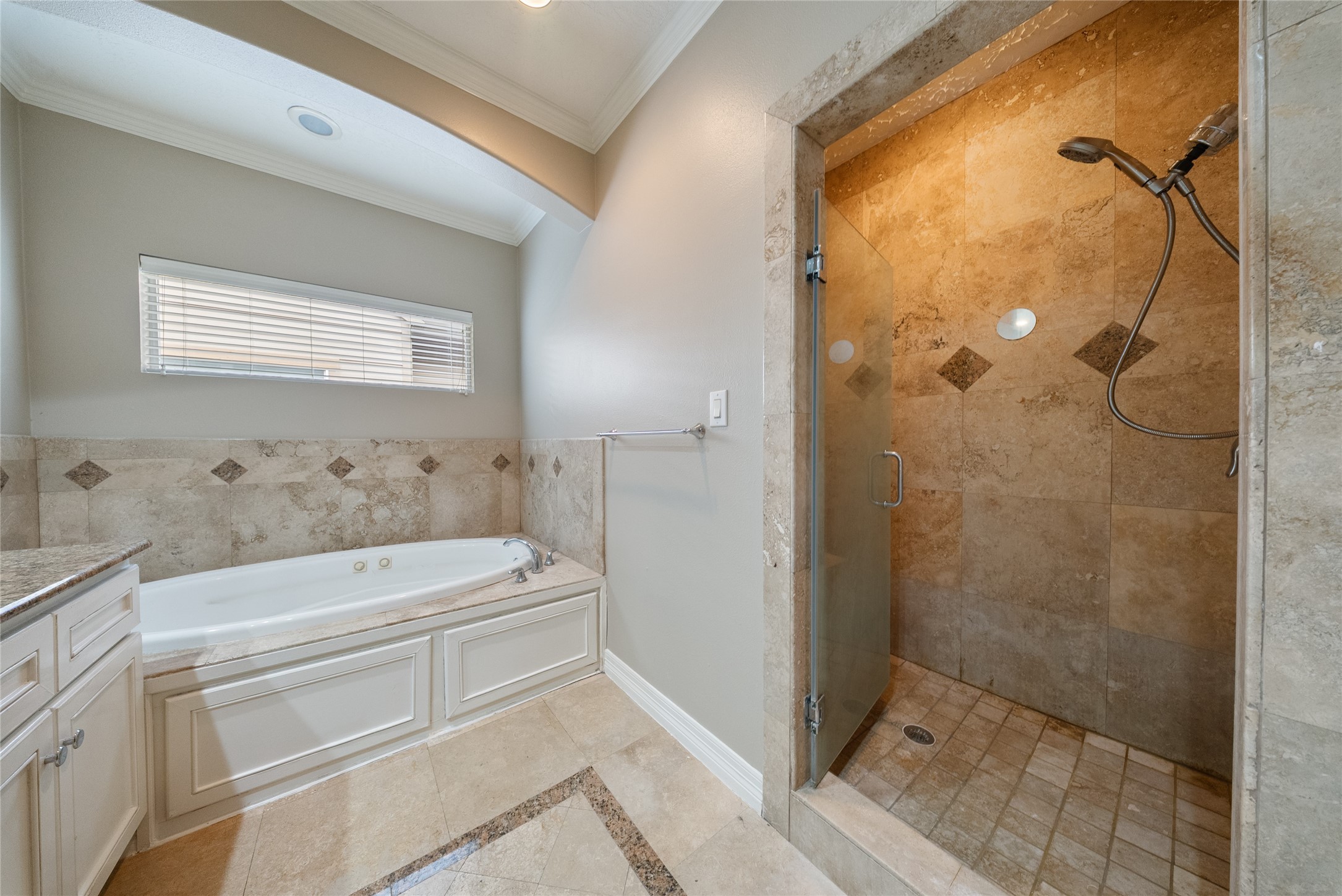 4216 Eli Street Houston, TX 77007 - Photo 14 of 25 a bathroom with a tub a sink and shower