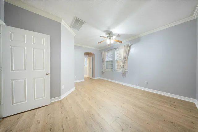 a bathroom with a toilet a sink and a mirror