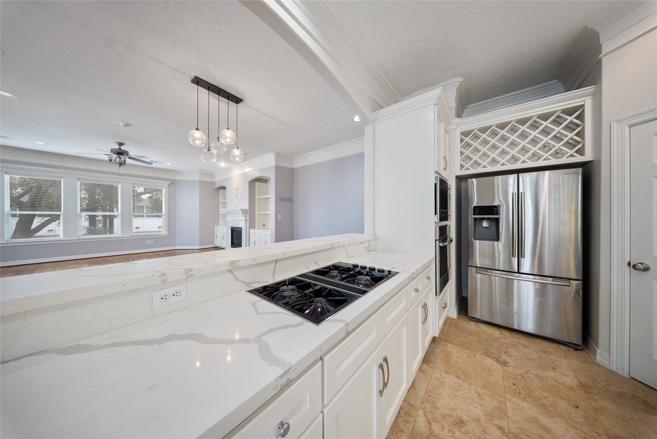 4216 Eli Street Houston, TX 77007 - Photo 3 of 25 a kitchen with stainless steel appliances granite countertop a refrigerator a sink dishwasher a stove and a refrigerator with wooden floor