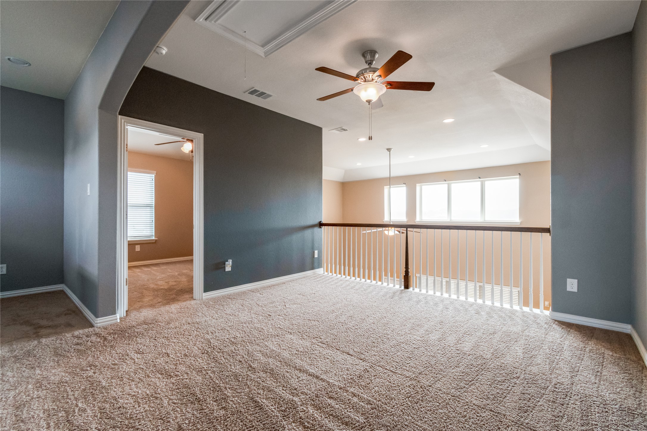 3413 Grail Hollows Road Pflugerville, TX 78660 - Photo 23 of 36 Unfurnished room with a ceiling fan, recessed lighting, and carpet