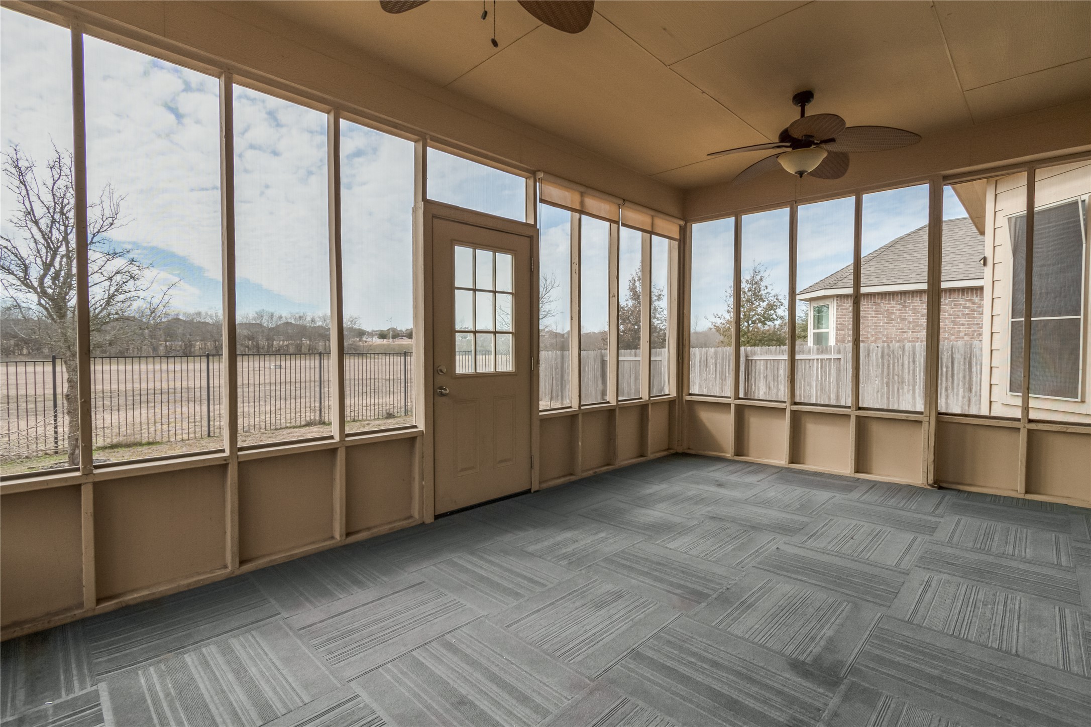 3413 Grail Hollows Road Pflugerville, TX 78660 - Photo 32 of 36 Unfurnished sunroom featuring a ceiling fan and healthy amount of natural light
