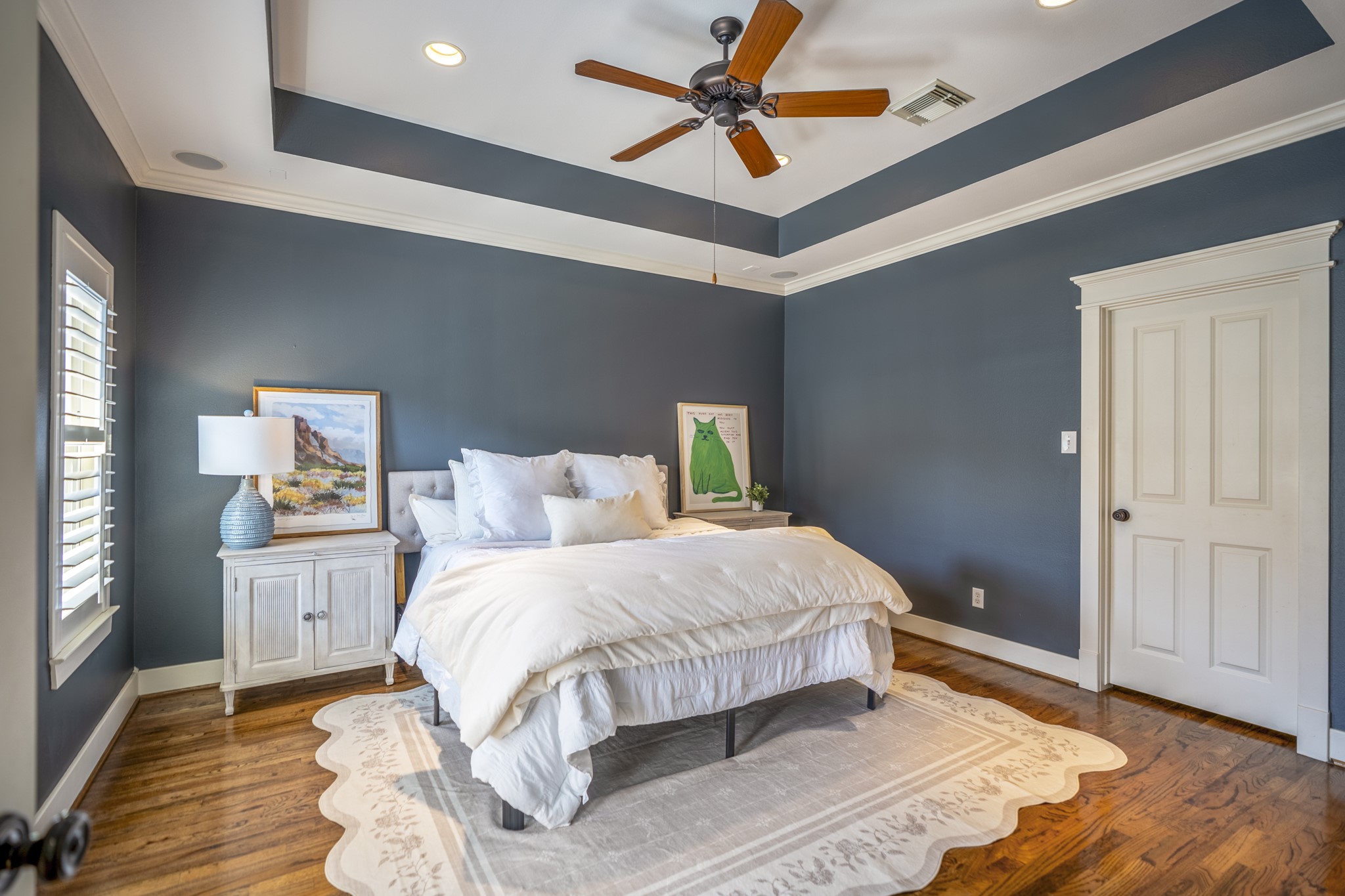 905 West 23rd Street Houston, TX 77008 - Photo 30 of 46 Primary suite designed for comfort with elevated ceilings and indoor-outdoor connection.