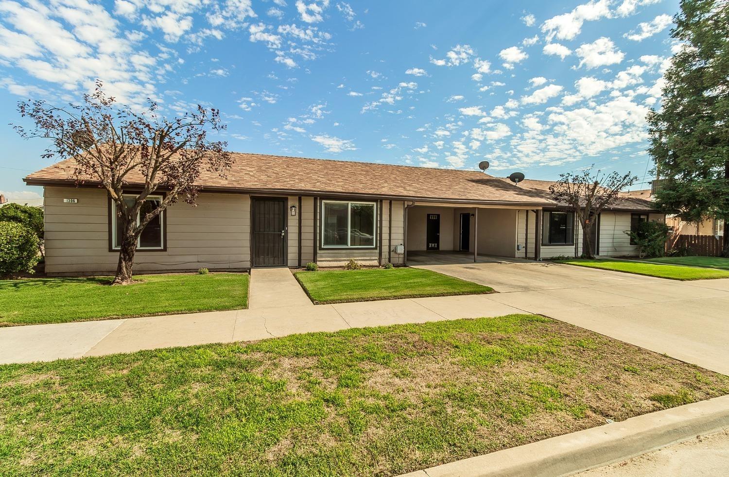 1306 13th Street Reedley, CA 93654 - Photo 1 of 14 a view of house with a yard