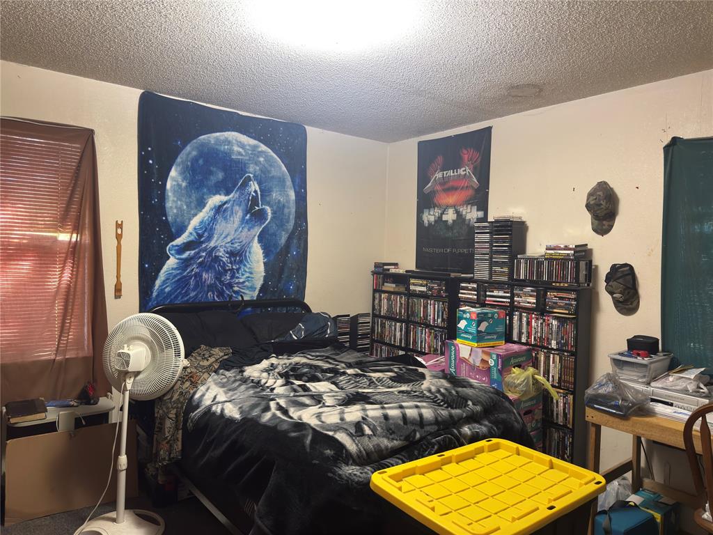 12776 Valverde Loop Terrell, TX 75161 - Photo 32 of 36 a room with musical instruments