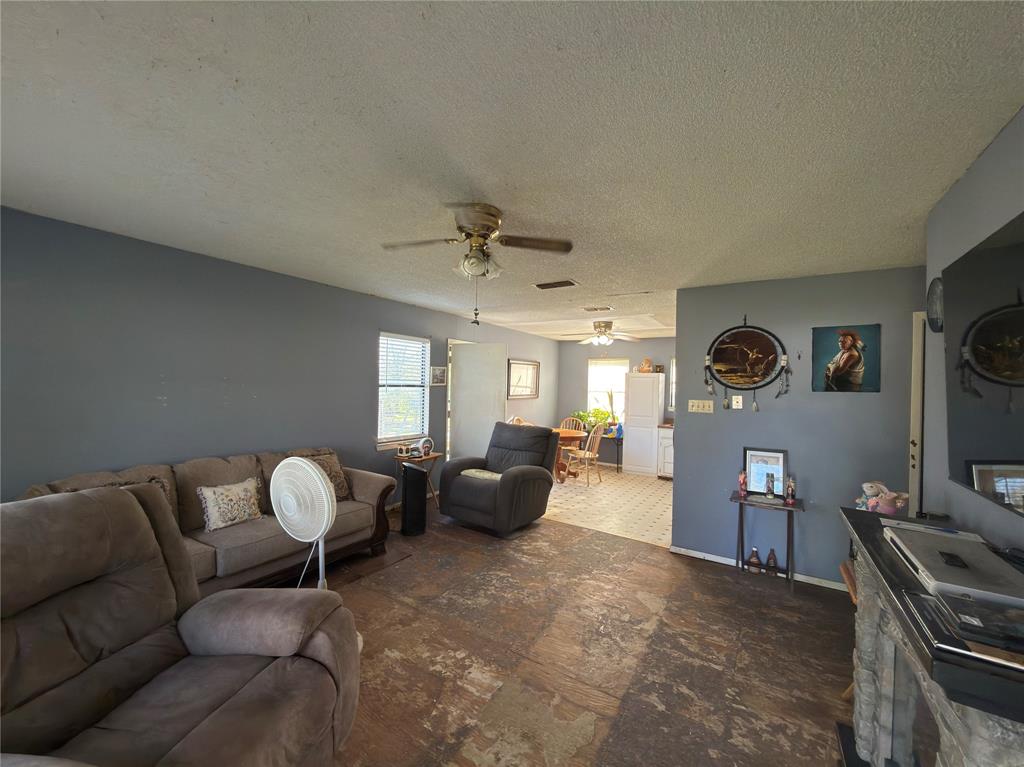 12776 Valverde Loop Terrell, TX 75161 - Photo 5 of 36 a living room with furniture