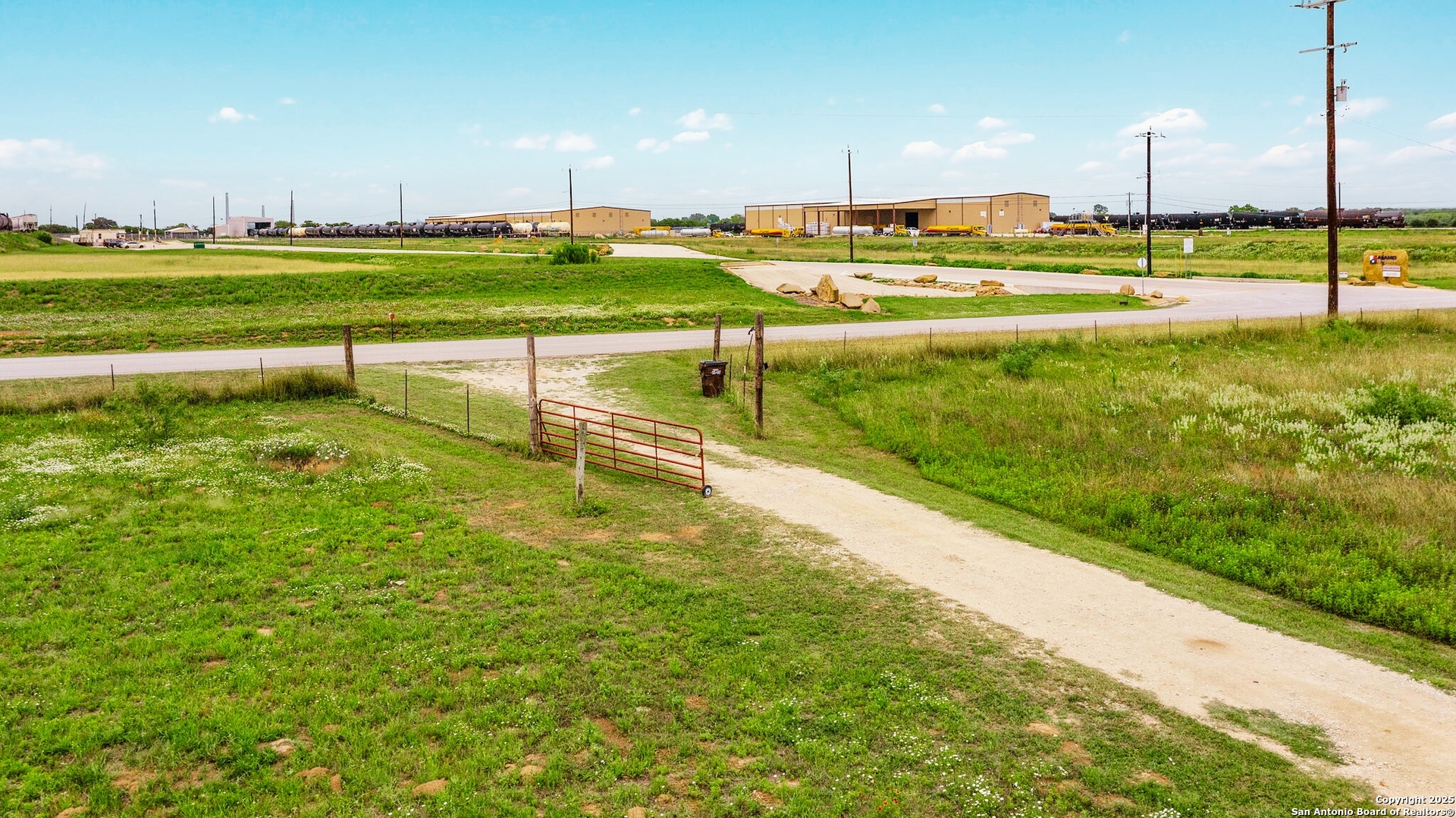 0 Borregas Road Elmendorf, TX 78112 - Photo 10 of 12 a view of a golf course with a swimming pool