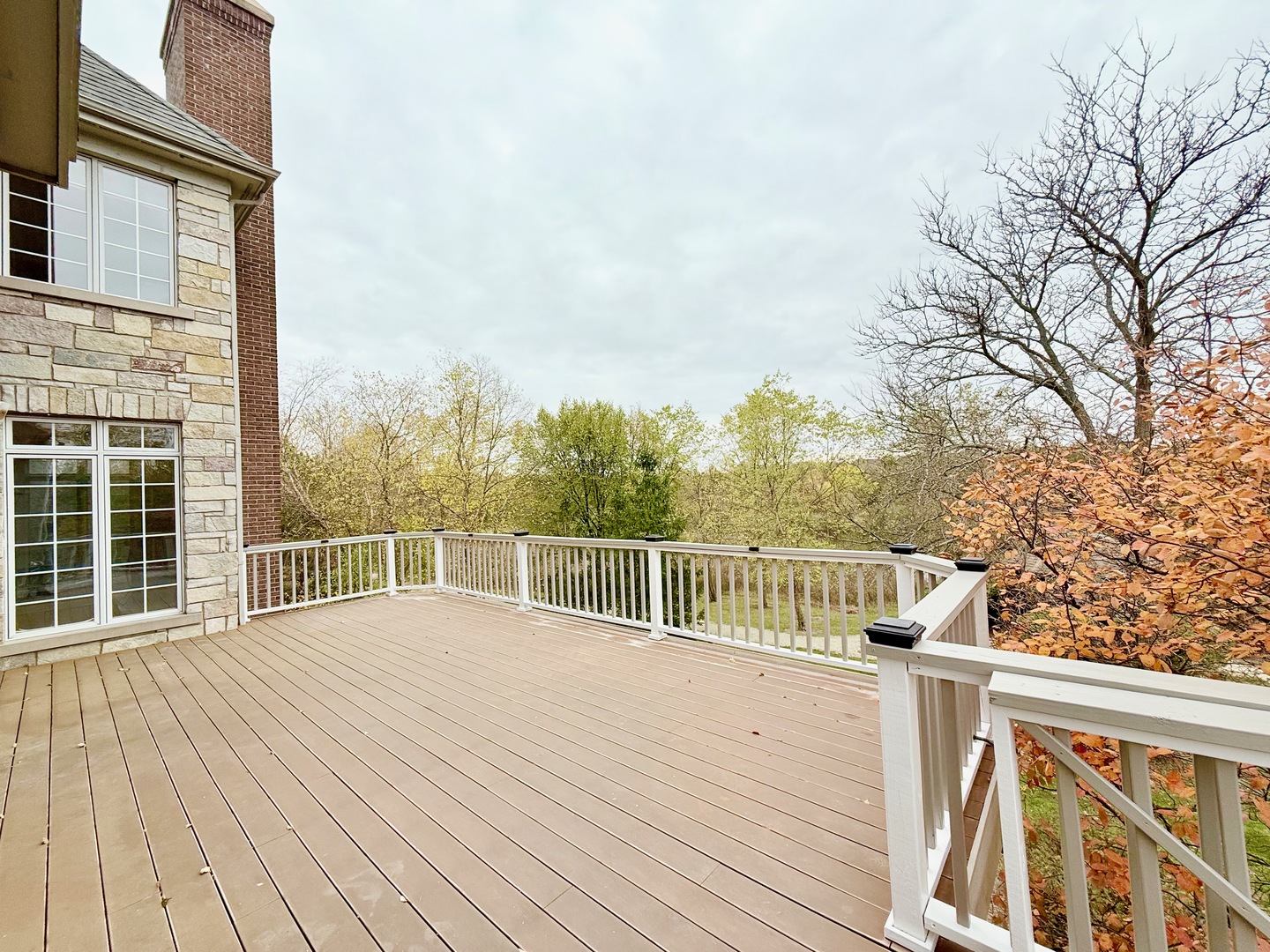 22206 North Prairie Lane Kildeer, IL 60047 - Photo 13 of 34 a view of balcony with wooden floor and fence