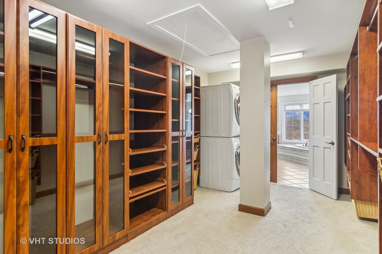 22206 North Prairie Lane Kildeer, IL 60047 - Photo 19 of 34 a view of walk in closet with empty racks