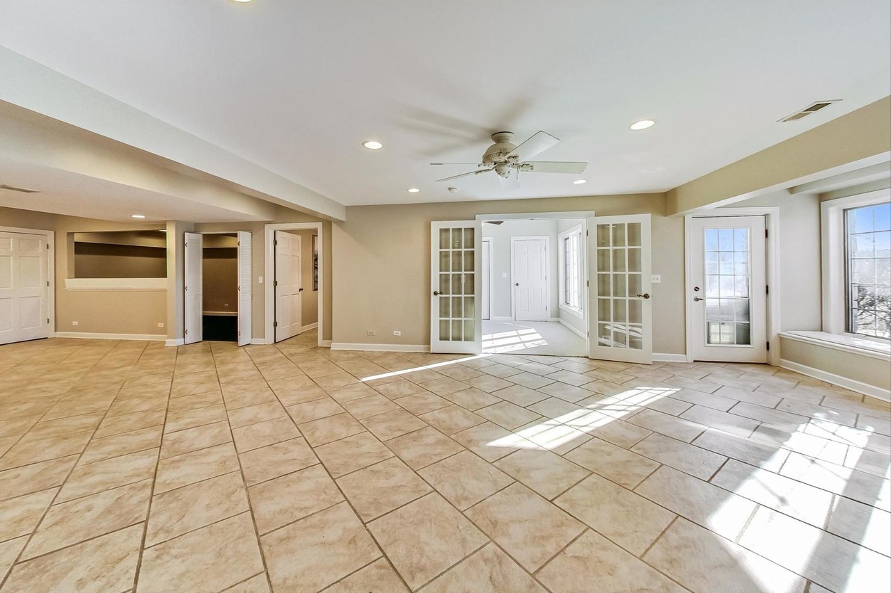 22206 North Prairie Lane Kildeer, IL 60047 - Photo 31 of 34 a view of an empty room with wooden floor