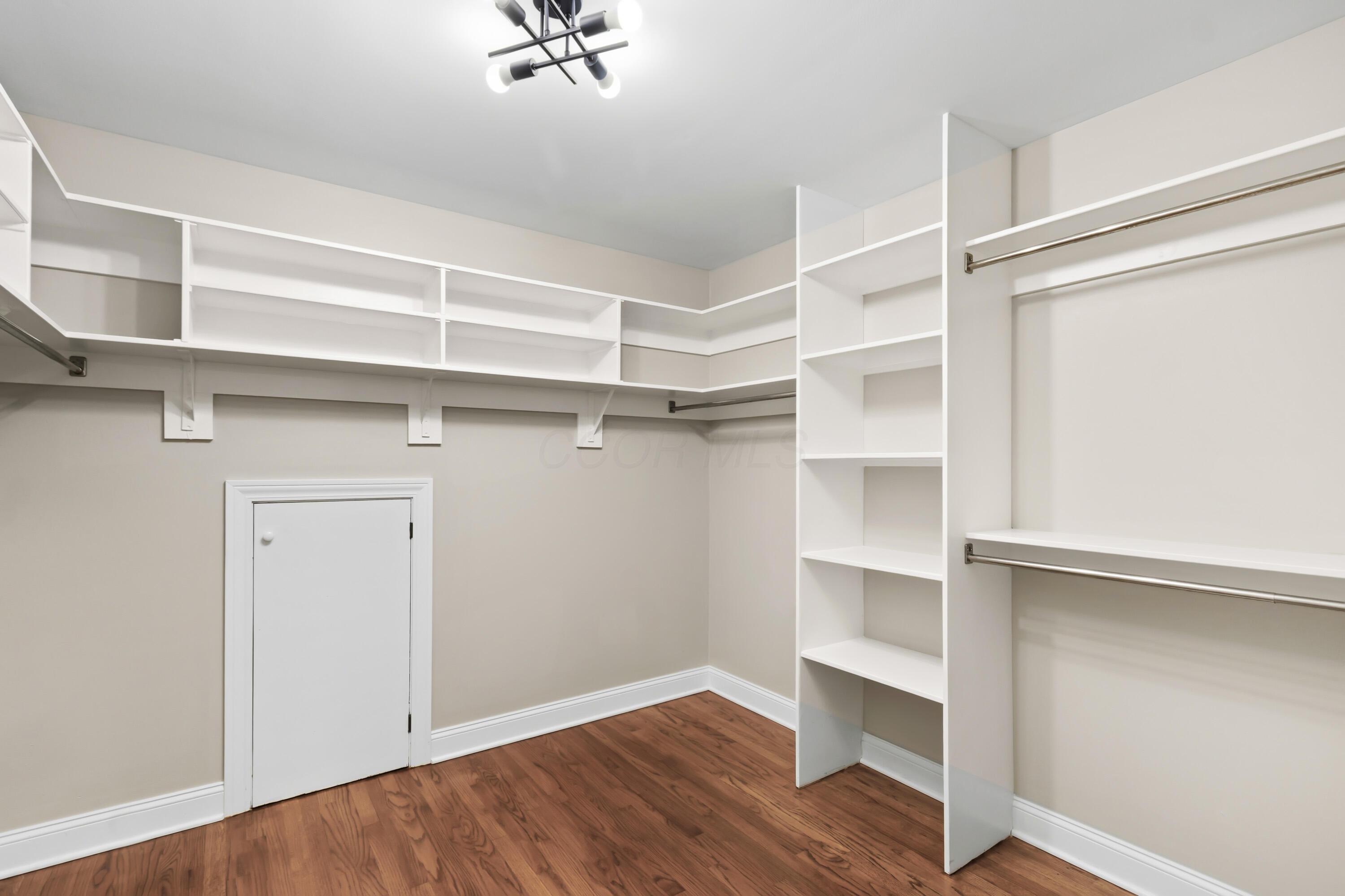 1560 Carriage Road Powell, OH 43065 - Photo 41 of 73 2nd primary closet featuring built-in shelving and hanging rods