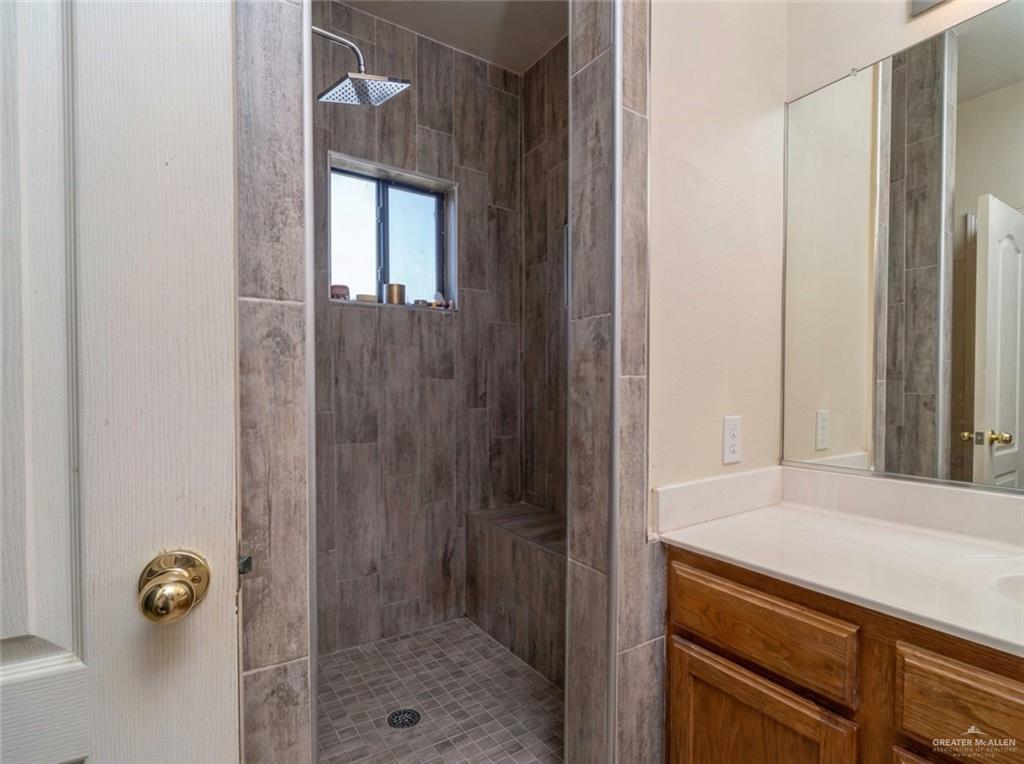 4706 North Trosper Road Mission, TX 78573 - Photo 8 of 12 a bathroom with a shower