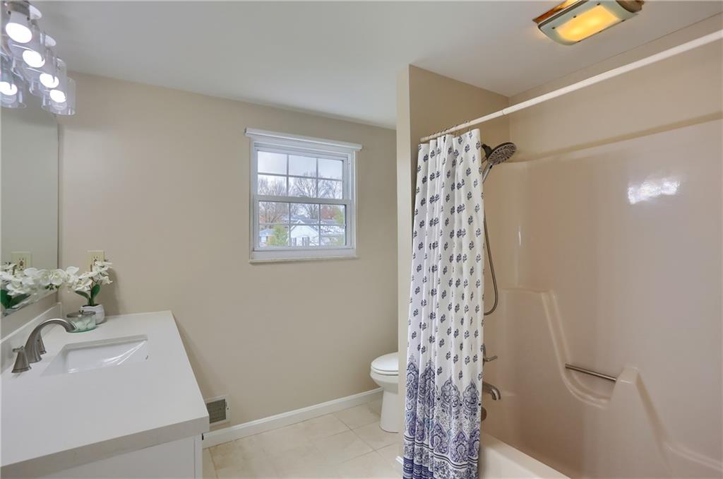 1702 Guyton Road Allison Park, PA 15101 - Photo 20 of 40 a bathroom with a sink a toilet and shower