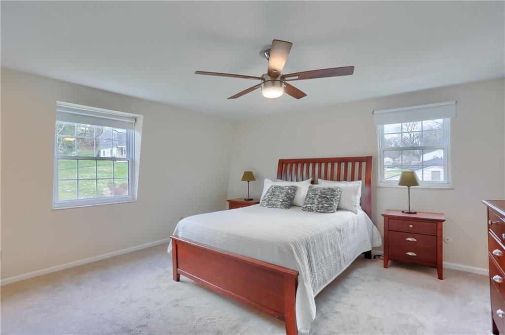 1702 Guyton Road Allison Park, PA 15101 - Photo 21 of 40 a bedroom with a bed and a window