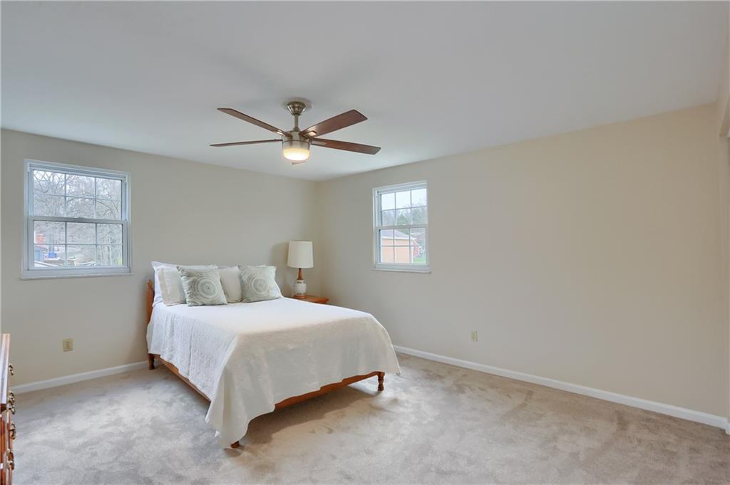 1702 Guyton Road Allison Park, PA 15101 - Photo 27 of 40 a bedroom with a bed and a window