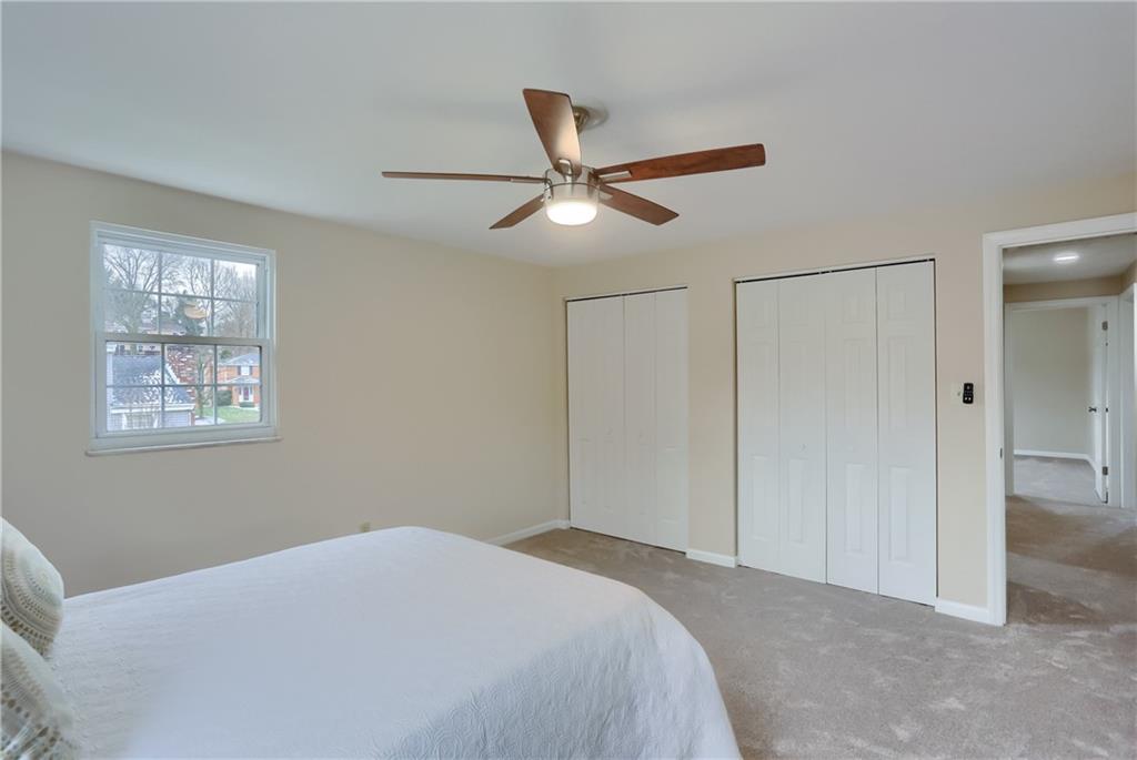 1702 Guyton Road Allison Park, PA 15101 - Photo 29 of 40 a bedroom with a bed and a ceiling fan