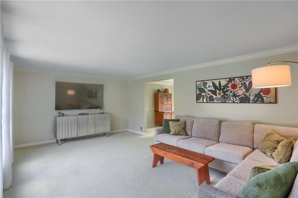 1702 Guyton Road Allison Park, PA 15101 - Photo 5 of 40 a living room with furniture and a flat screen tv