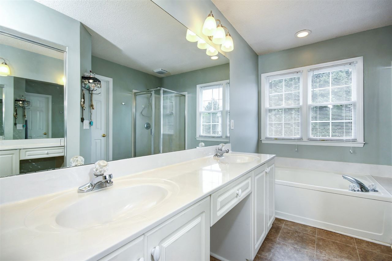 5300 Halcott Court Raleigh, NC 27613 - Photo 15 of 23 Lovely owner's suite with dual vanities and plenty of counter space. No fighting over counter space in this large master! Owner's Suite