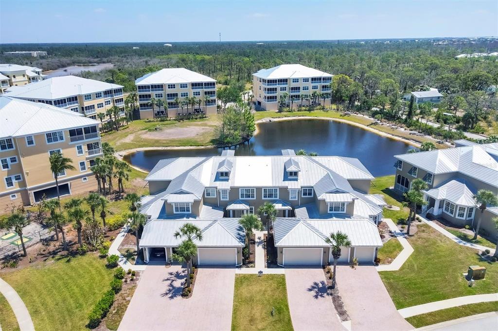 10720 Lemon Creek Loop, Unit 103 Englewood, FL 34224 - Photo 23 of 57 a view of a city from a terrace