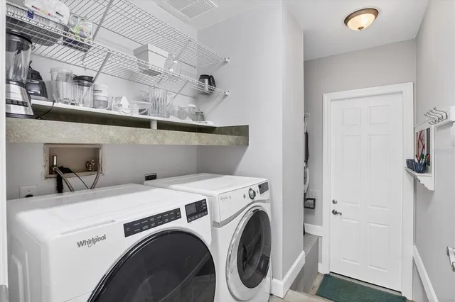 a bathroom with a sink a mirror and a toilet