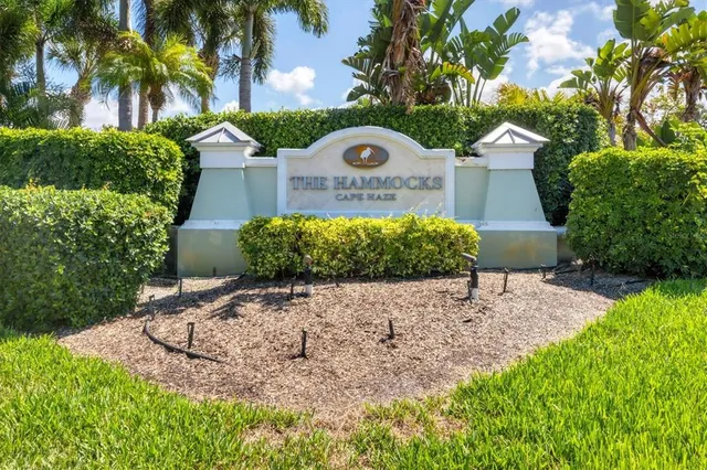 a room with gym equipment and large window