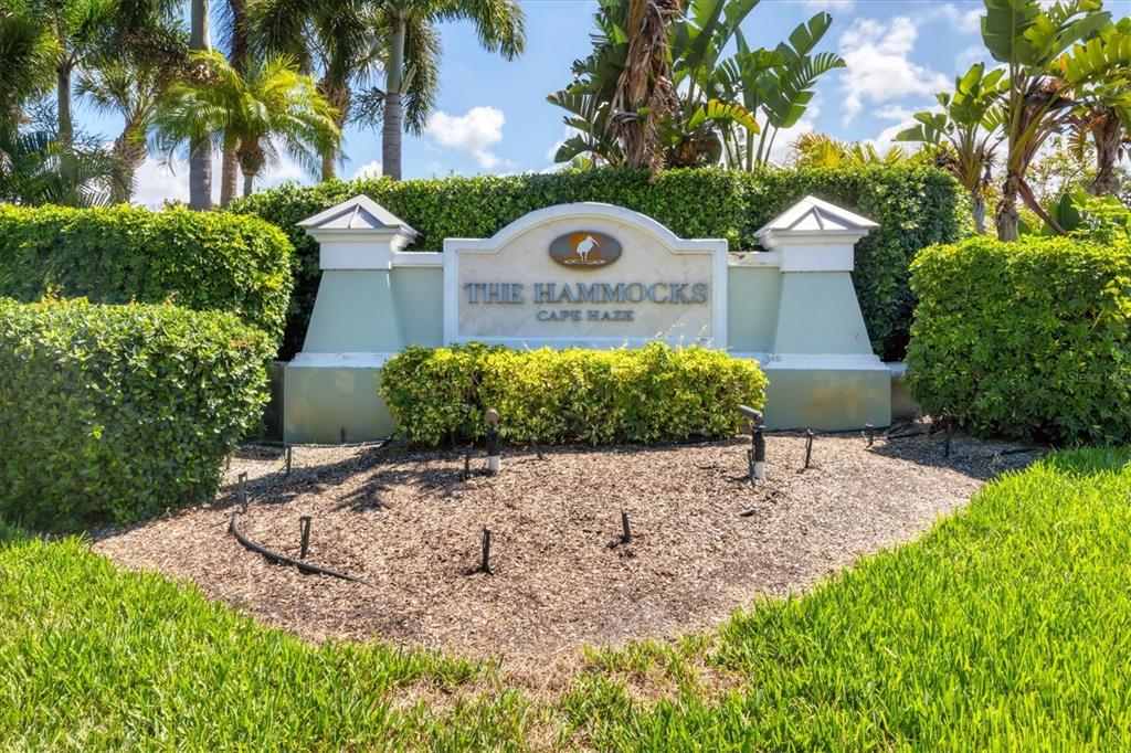 10720 Lemon Creek Loop, Unit 103 Englewood, FL 34224 - Photo 41 of 57 a front view of a house with a yard