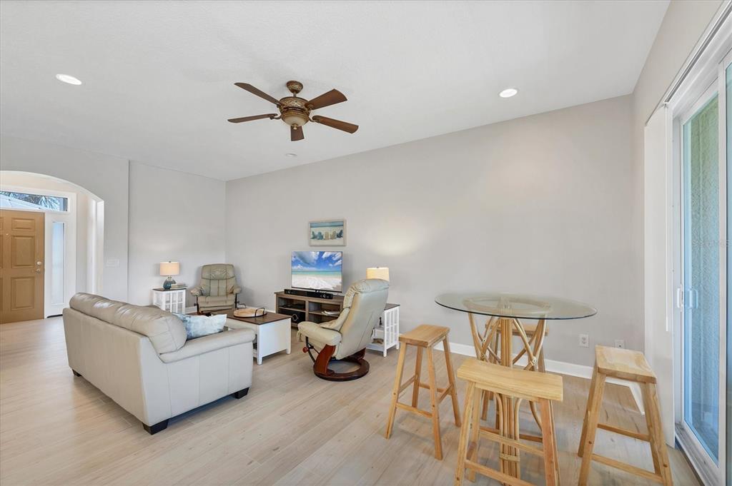 10720 Lemon Creek Loop, Unit 103 Englewood, FL 34224 - Photo 7 of 57 a living room with furniture