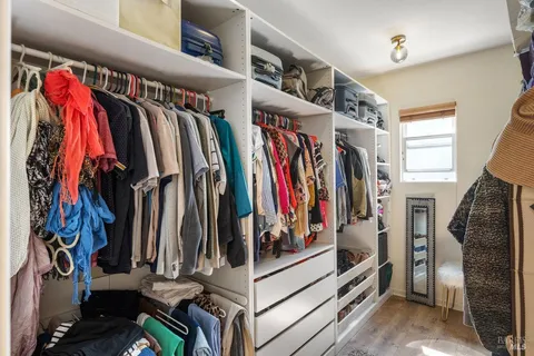 a utility room with sink dryer and washer