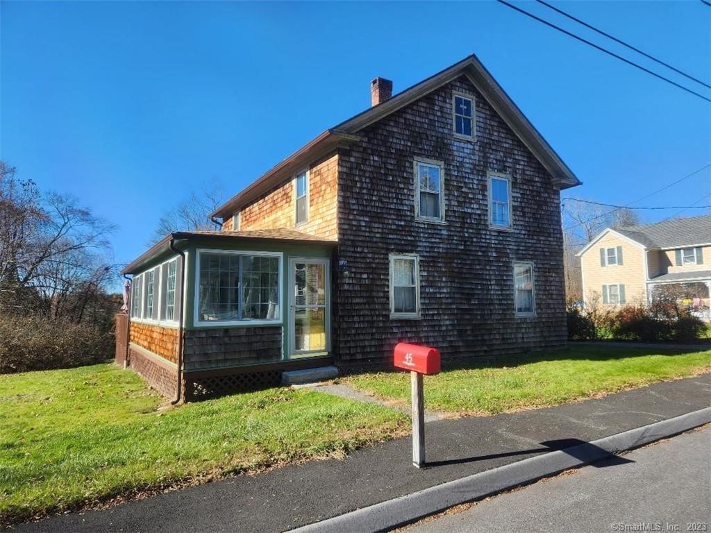 45 Spencer Street Litchfield, CT 06759 - Photo 1 of 1 a front view of a house with a yard